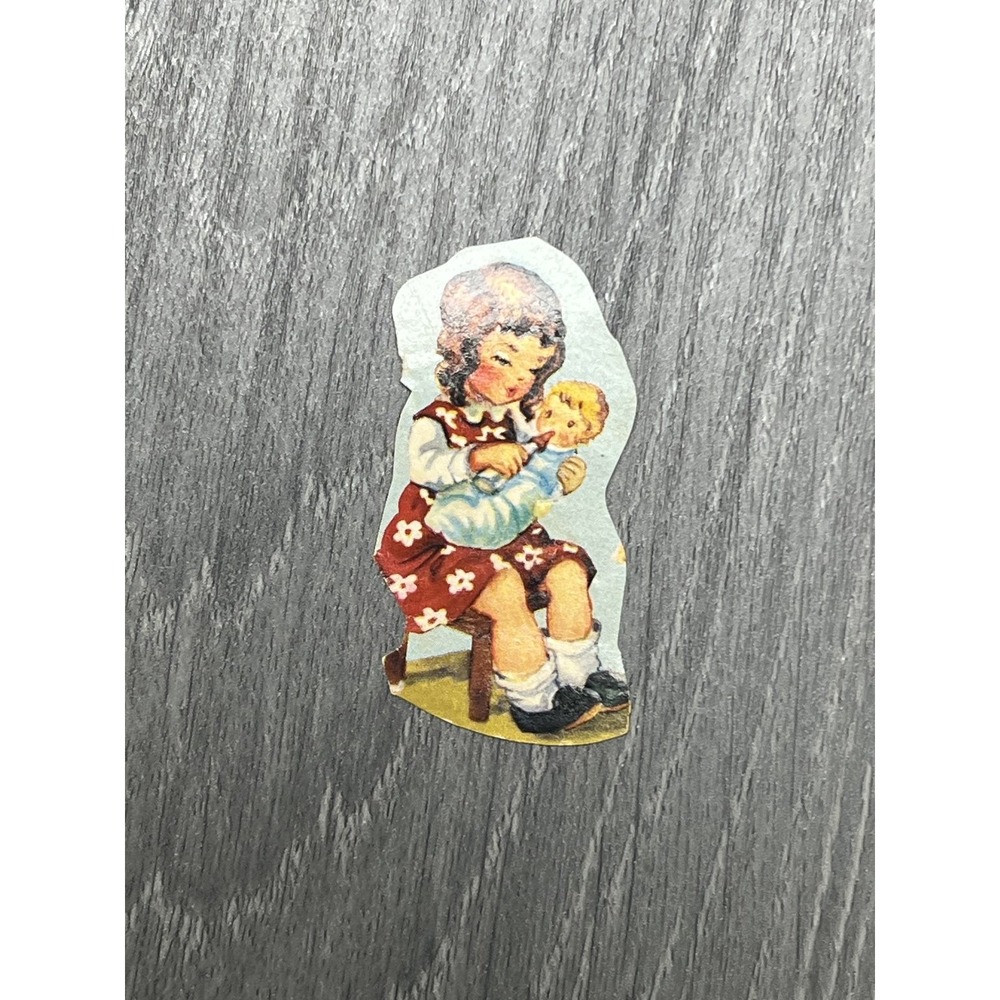 Vintage Die Cut Paper Scrap Little Girl Holding Baby Illustration Ephemera - Picture 1 of 4